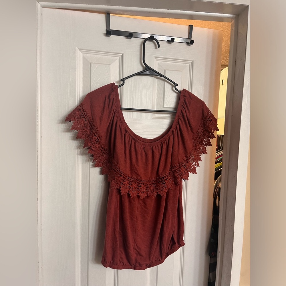 you can wear this shirt over or down the shoulders